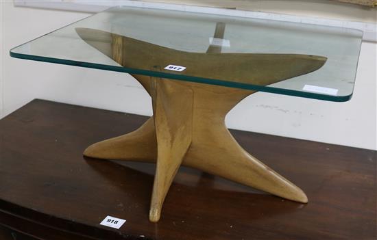 A modern teak glass topped coffee table W.61cm.